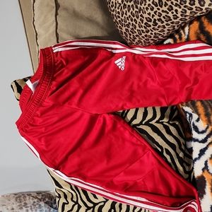 Red adidas pants.These are the deep red ones.Long stripes all the way down.